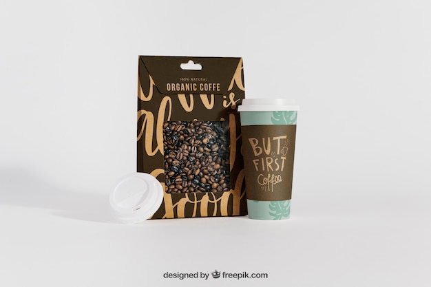 Mockup of coffee cup next to bag