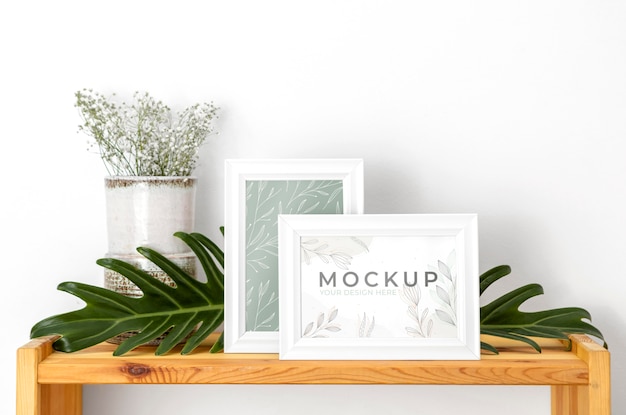 Mockup frame beside flowers