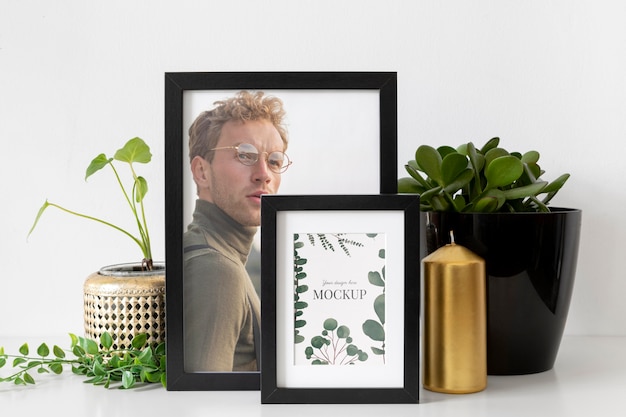 PSD mockup frame on table beside plants