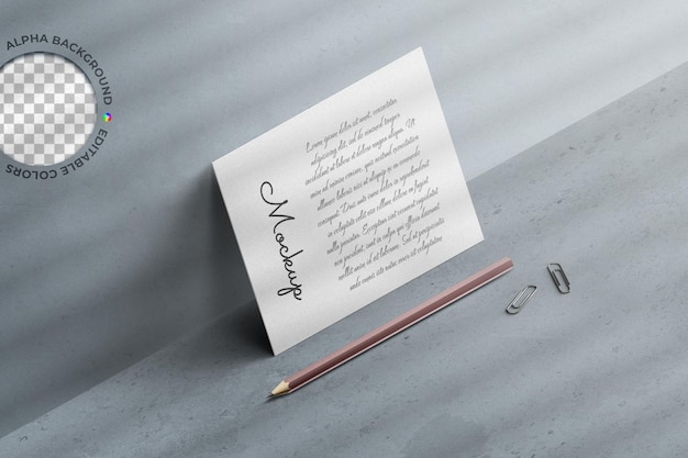 Mockup of invitation postcard greeting a5 flyer with stationery arrangement high angle isolated