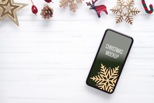 Mockup mobile smart phone for Christmas and New Year background