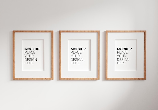 Mockup Three empty photo frame for mockup in empty white room Template PSD