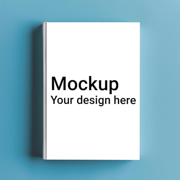 Mockup of white book on blue background