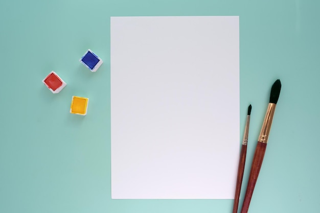 PSD mockup white paper blank watercolour painting with brushes