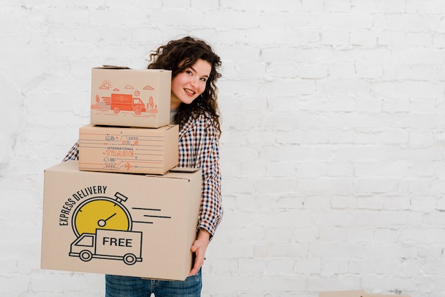 Mockup of woman with cardboard boxes