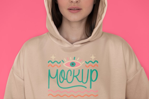 Model posing in hoodie front view