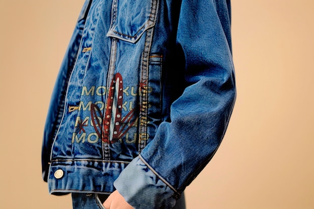 Model wearing embroidered denim outfit