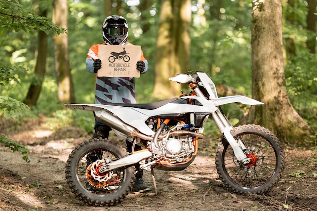 PSD motorcyclist holding sign