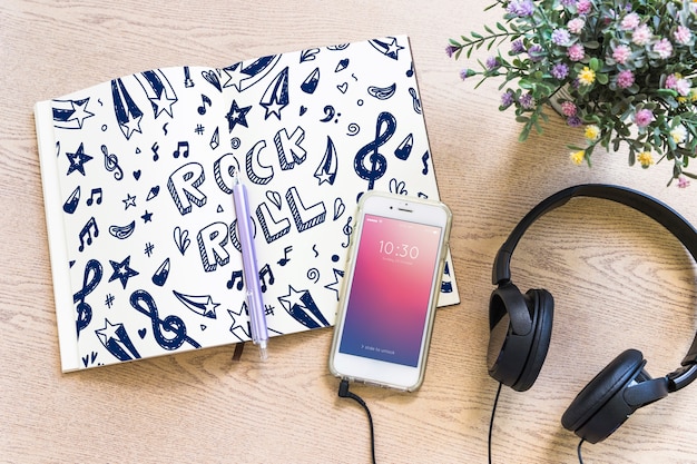 Music mockup with headphones and smartphone