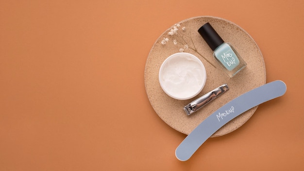 Nail polish bottle mock-up with manicure essentials