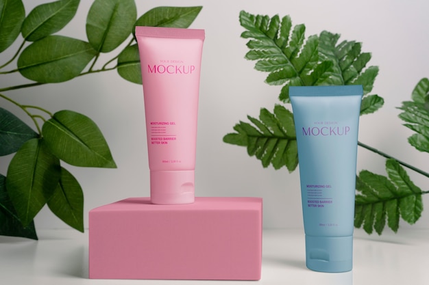 Natural cosmetic product packaging mock-up design with leaves