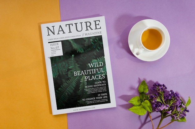 Nature magazine next to coffee cup and lavender