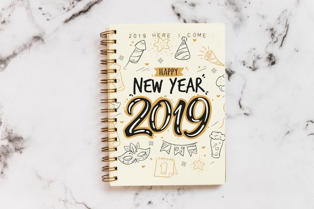 Notebook mockup with new year concept