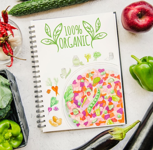 Notebook mockup with vegan food