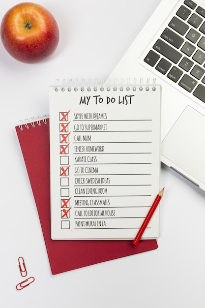 Notebook with to do list desktop concept