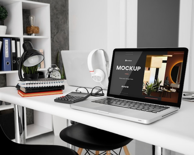 Office desk mock-up with laptop device