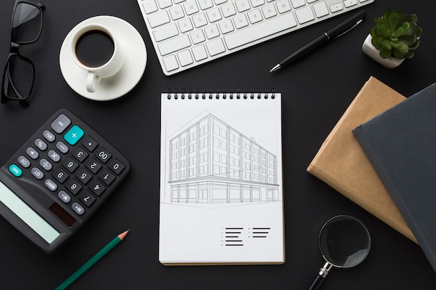 PSD office desk with calculator, coffee and notebook mock-up