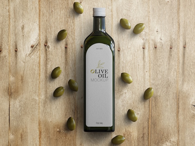 Olive oil glass bottle mockup with scattered olives on wooden table