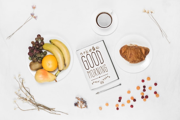 Open notebook mockup with breakfast concept