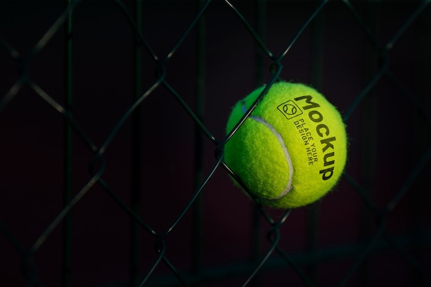 Outdoor tennis ball with fence