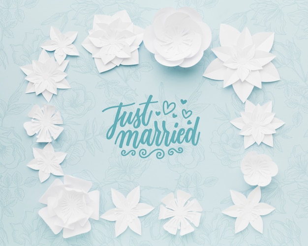 Paper flowers on blue wedding background mock-up