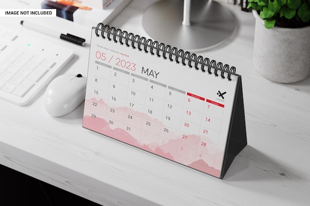 Paper spiral calendar in the workspace mockup