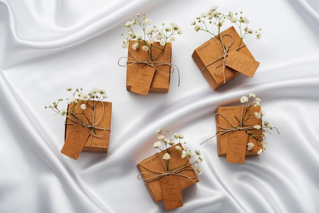 PSD paper wrapped wedding gift box with baby's breath flowers