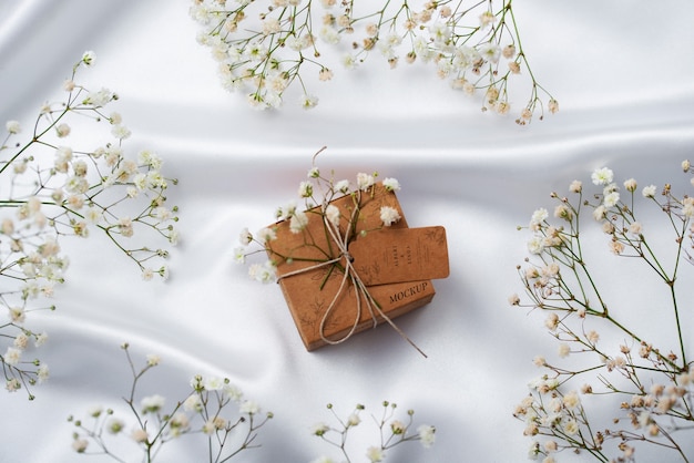 Paper wrapped wedding gift box with baby's breath flowers