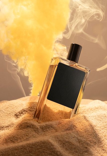 Perfume bottle in sand