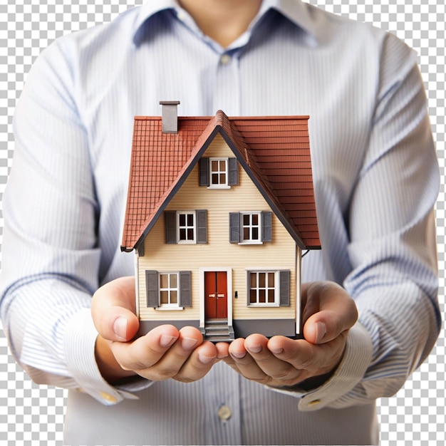 PSD a person holding a model of a house on transparent background