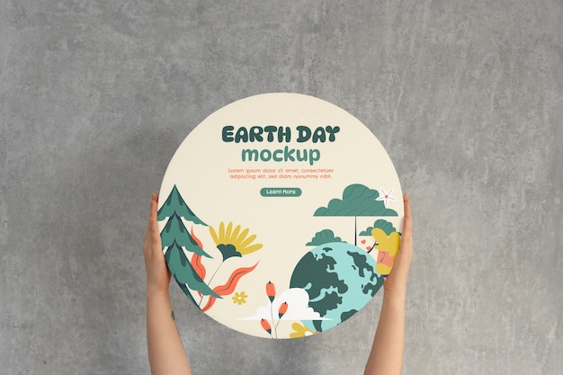 PSD person holding a signboard mockup for earth day