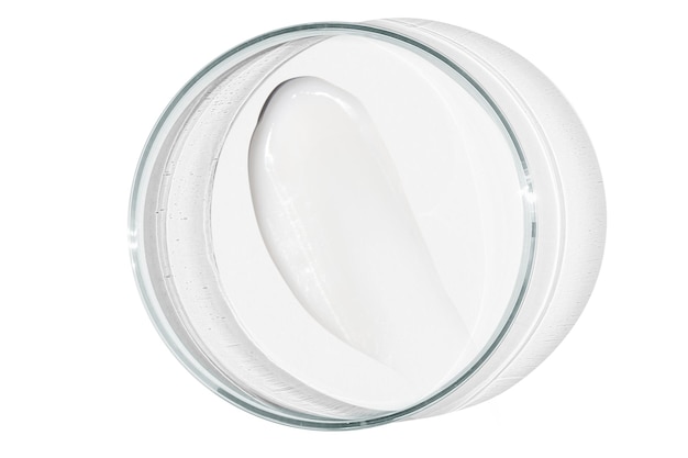 Petri dish isolated on empty background A smear of cosmetic cream in a Petri dish