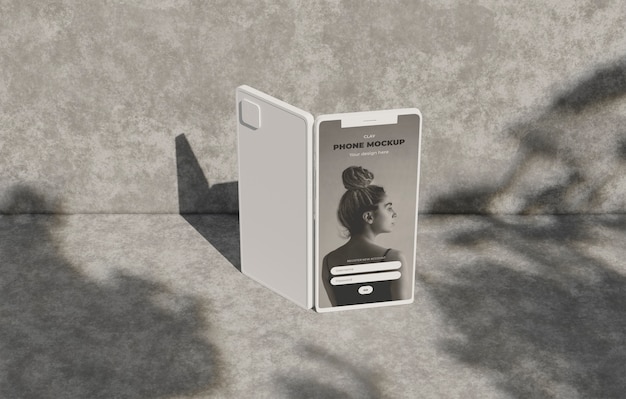 Phone mockup on concret wall with shadow