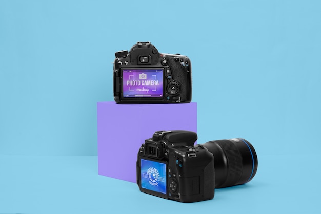 Photo camera with blue background mockup