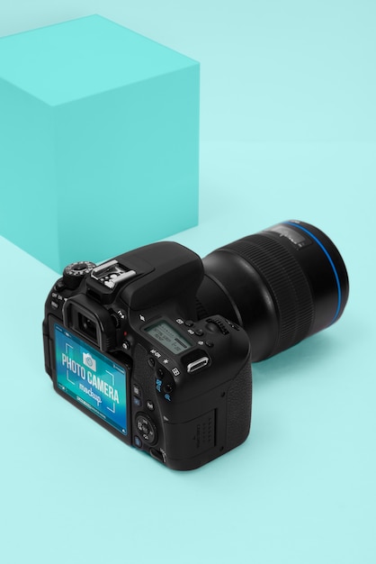 Photo camera with blue background mockup