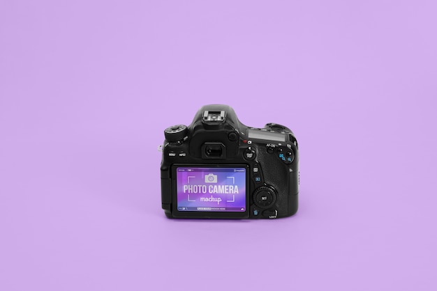 Photo camera with purple background mockup