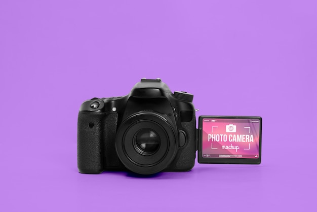 Photo camera with purple background mockup