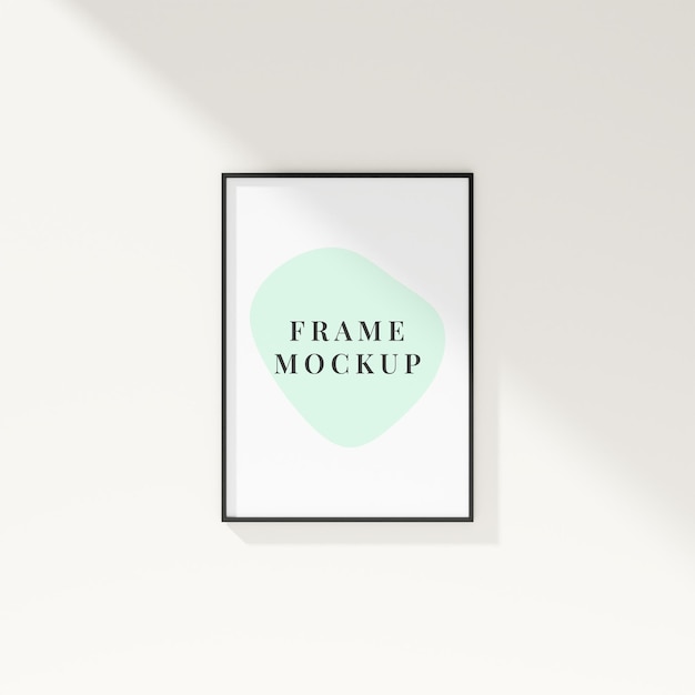 Photo frame mockup with empty space hanging on the wall