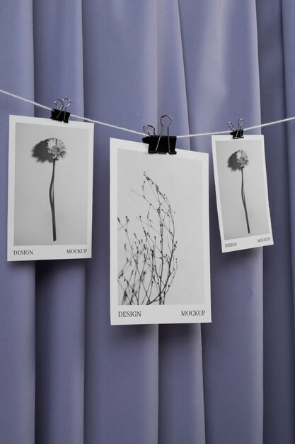 PSD photographs hanging from clothes line