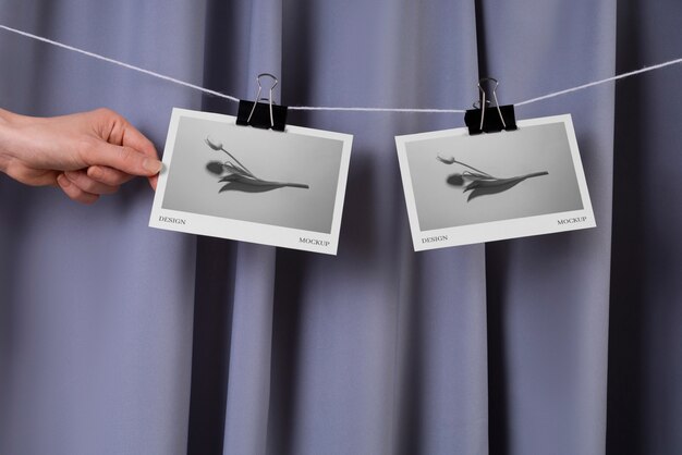 PSD photographs hanging from clothes line