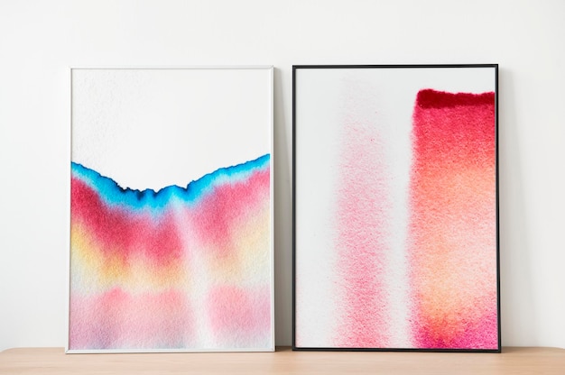 Picture frames mockup psd with chromatography art leaning against the wall