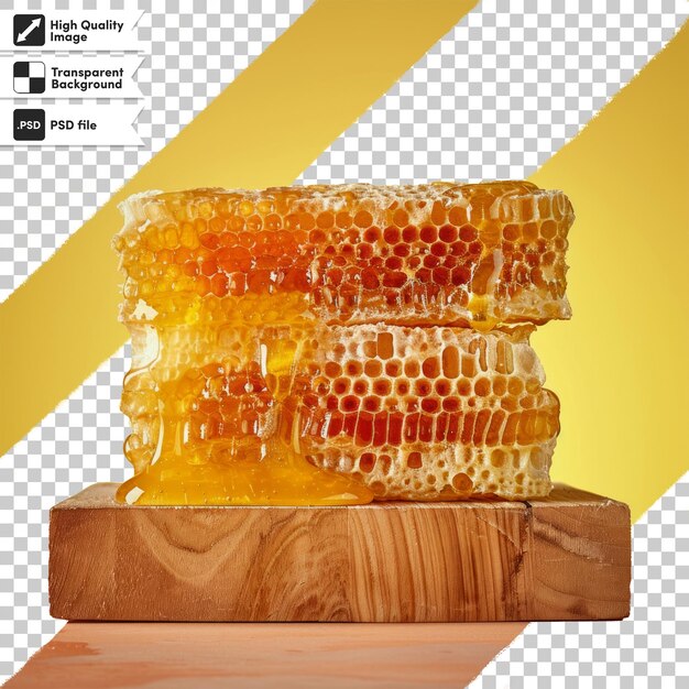 PSD a piece of honeycomb sits on a wooden block