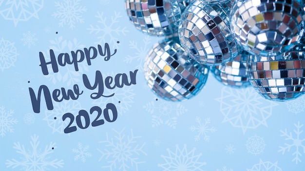 Pile of silver christmas balls on blue new year background