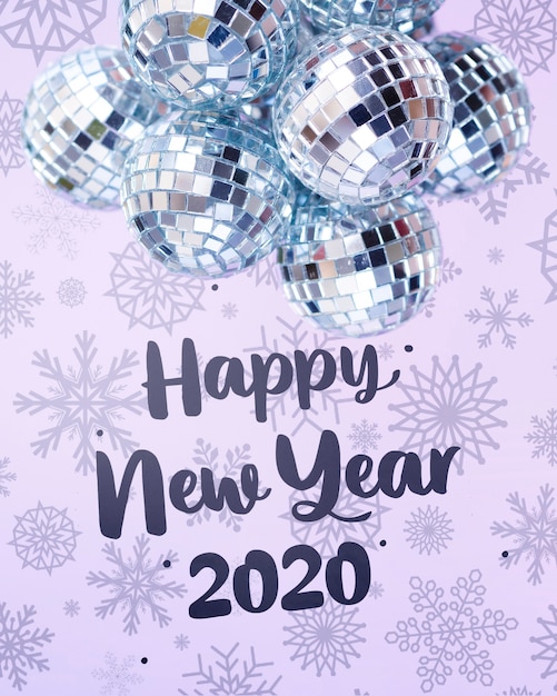 Pile of silver christmas balls on snowy new year background