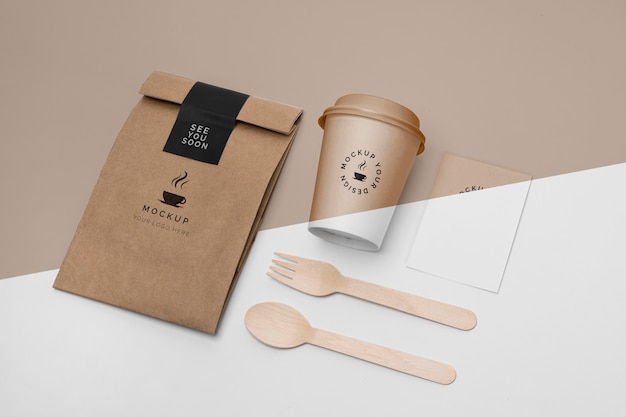 Plastic cup and paper bag with coffee mock up