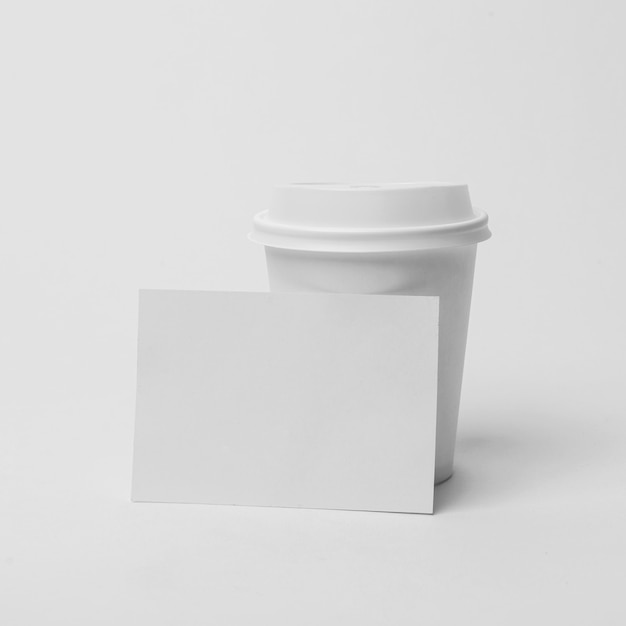 Plastic cups with coffee mock up on table