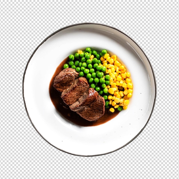 A plate of blackpaper steak with peas and corn sidedish on a transparent background