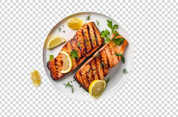 PSD a plate of food with a fish and vegetables grilled salmon with lemon isolated transparent background