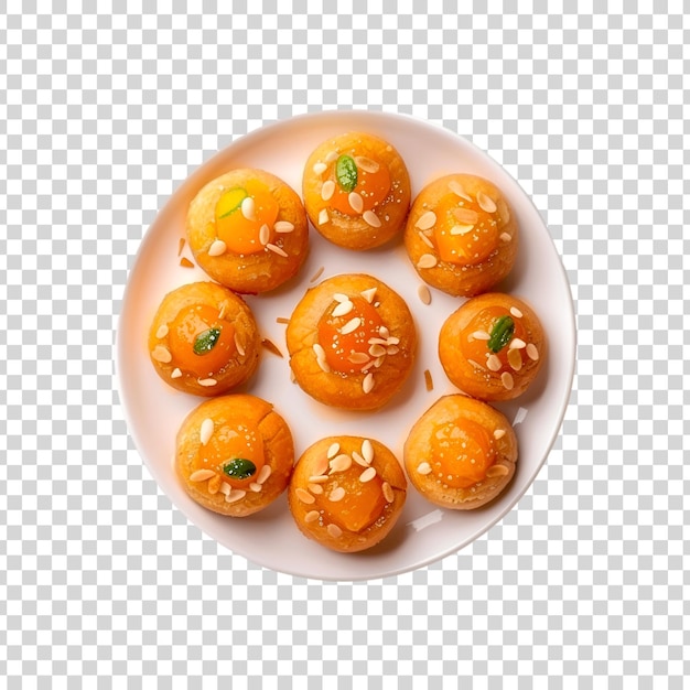 A plate of Indian sweets on a transparent background