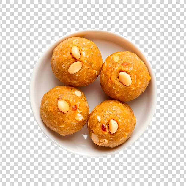 A plate of Indian sweets on a transparent background